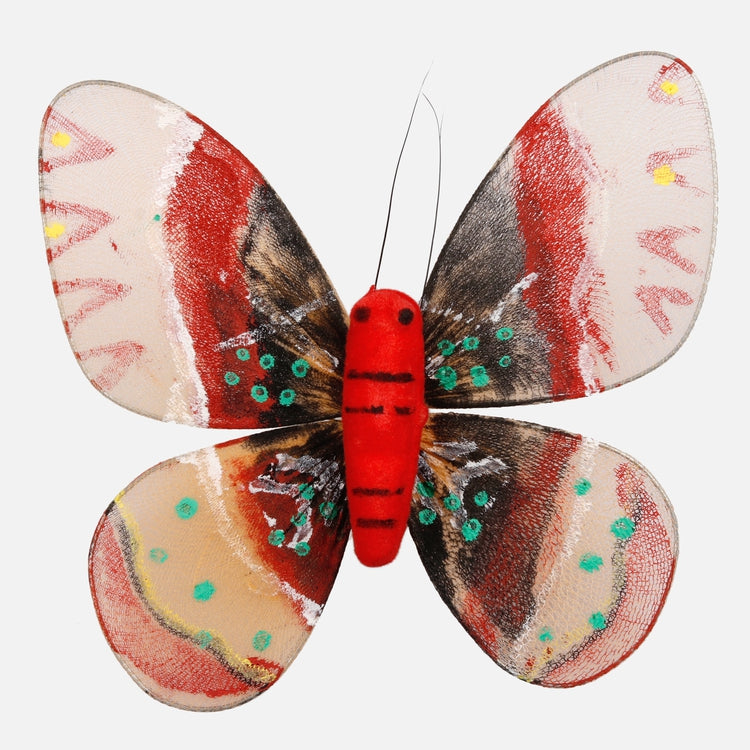 Perhonen klipsissä - Tekokukat.fi