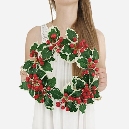 kranssi mustikoilla ja käpyillä
sininen