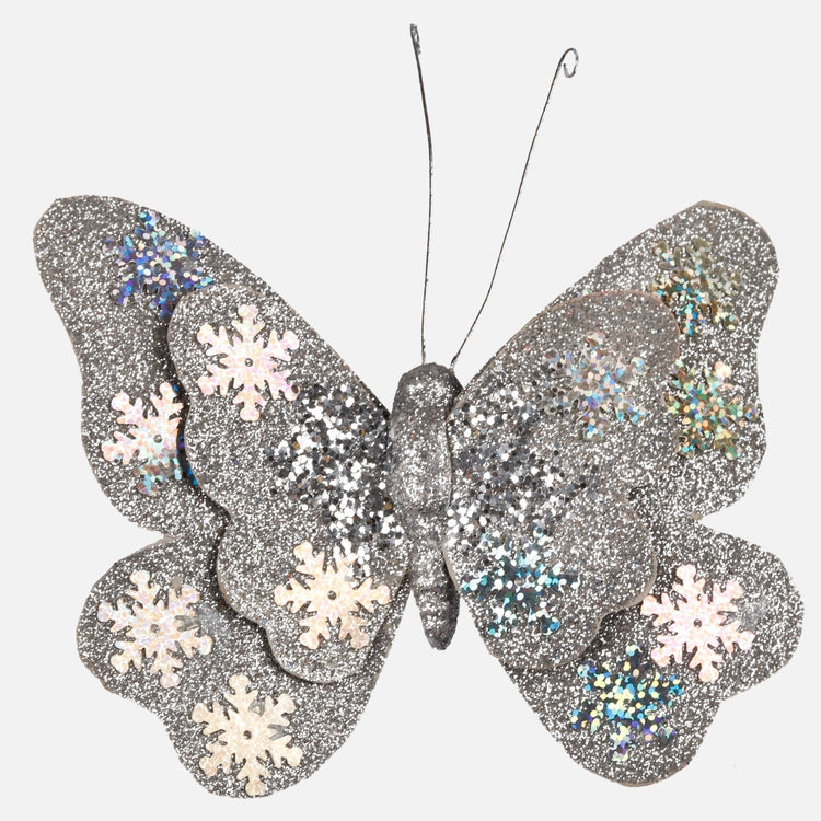 Perhonen klipsissä Sekoita 1 - Tekokukat.fi